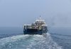 A large boat in the middle of the ocean
