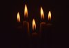 Moartea Brîndușei Armanca reconfigurează memoria culturală a Timișoarei a group of lit candles in the dark