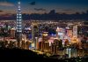 city skyline during night time