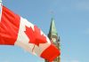 Canada cere aderarea la JEF și recalibrează alianțele de apărare A Canadian flag waving before the Peace Tower on Parliament Hill in Ottawa