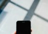 person holding black iphone 5